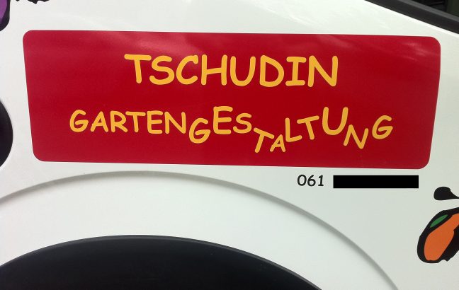 Comic Sans in German that says "Tschudin Gartengestaltung"