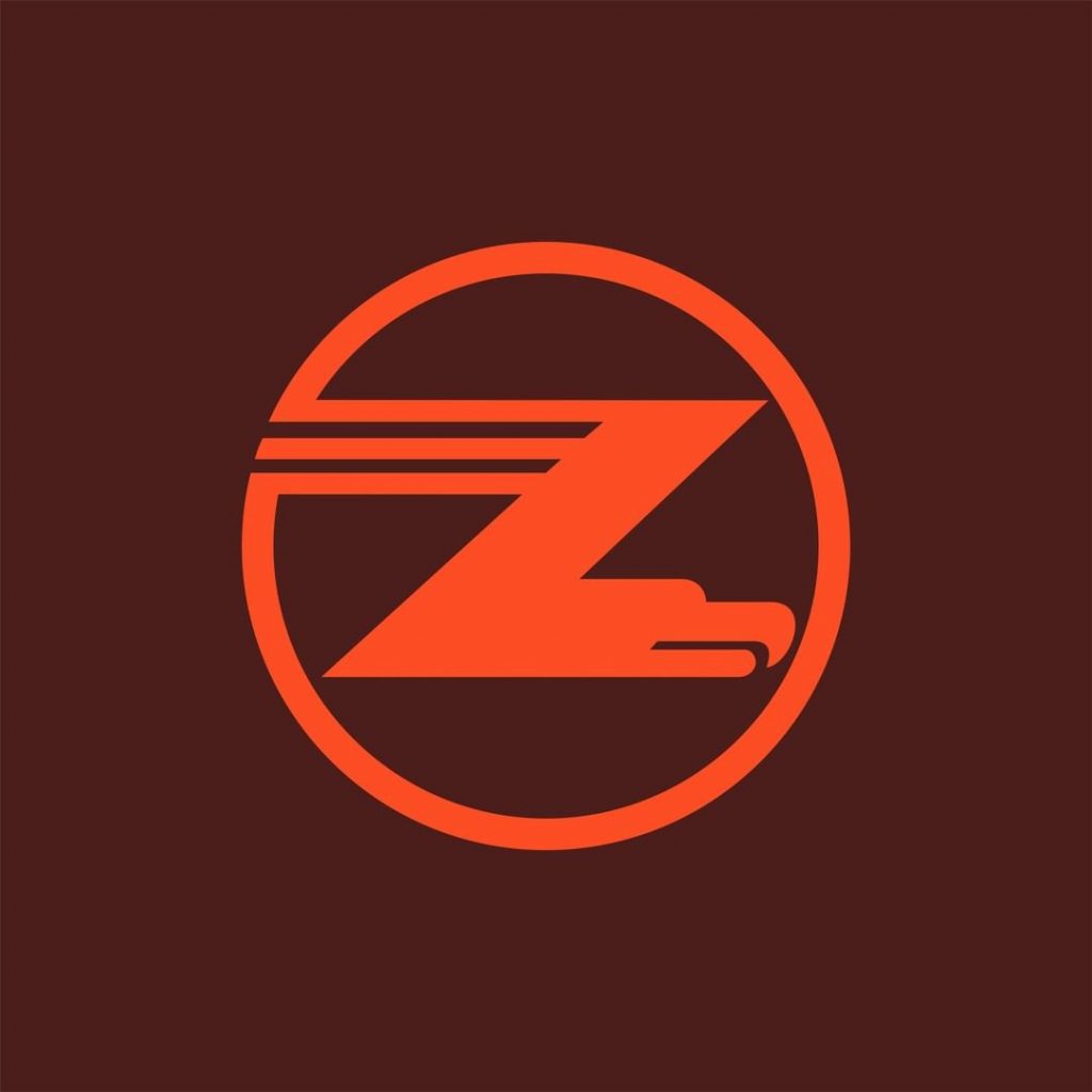 The Zambian Airways logo shows a bird of prey in a Z shape in orange, inside a circle, on a brown background
