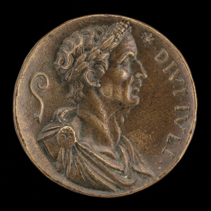 a bronze coin showing Julius Caesar
