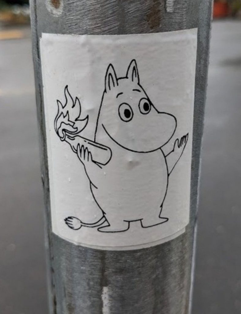 a drawing of a moomin holding a molotov cocktail